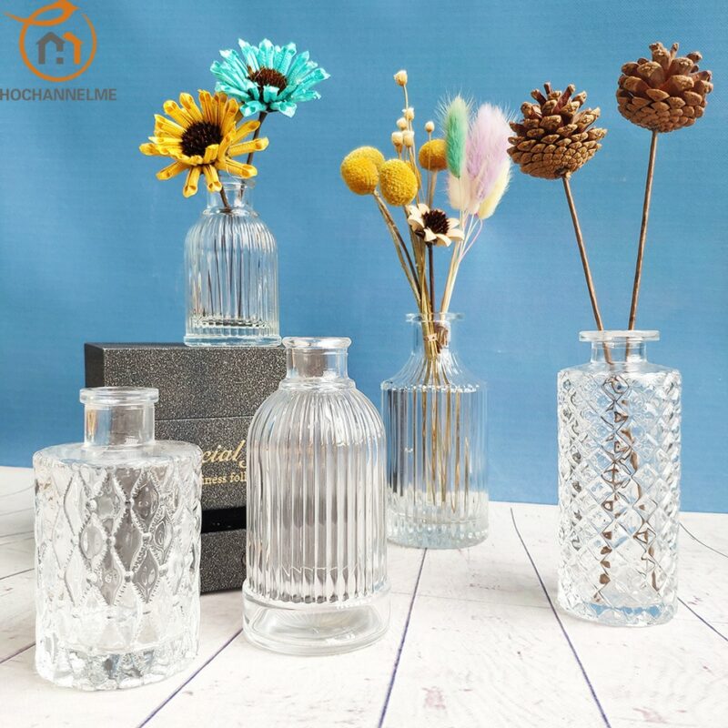 Vase bouteille en verre transparent avec motifs