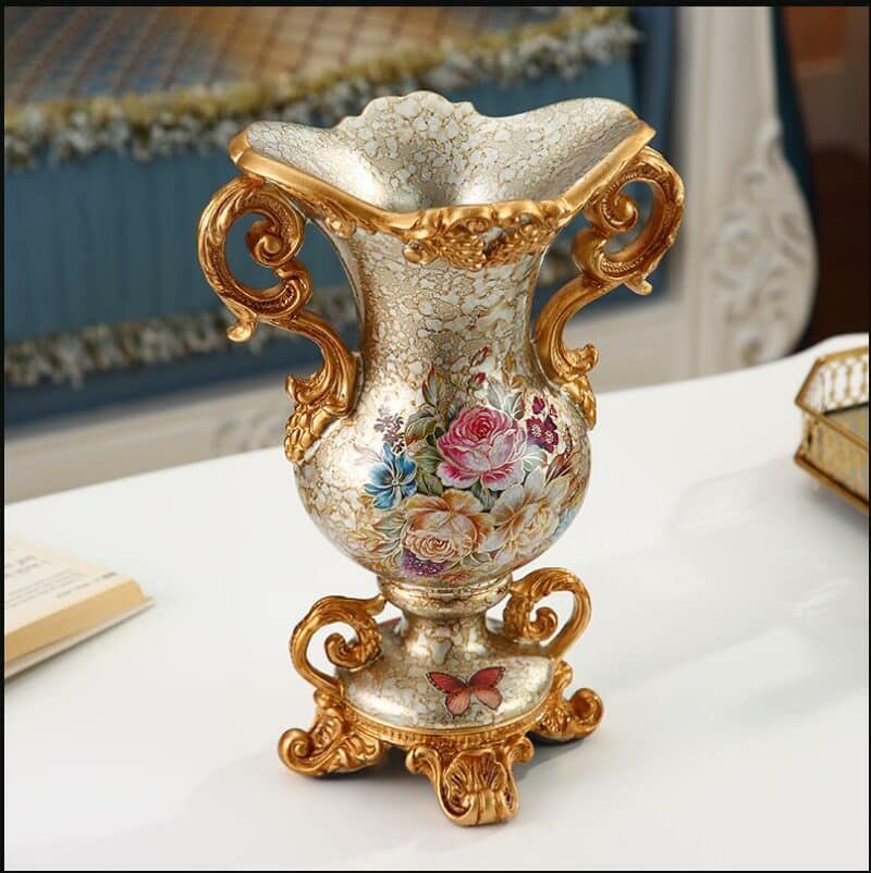 Vase vintage avec dorure et motif floral