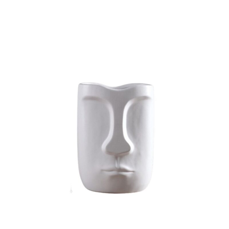 Vase blanc en forme de tête