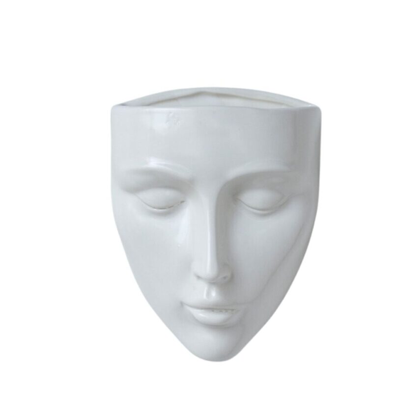 Vase blanc en forme de visage