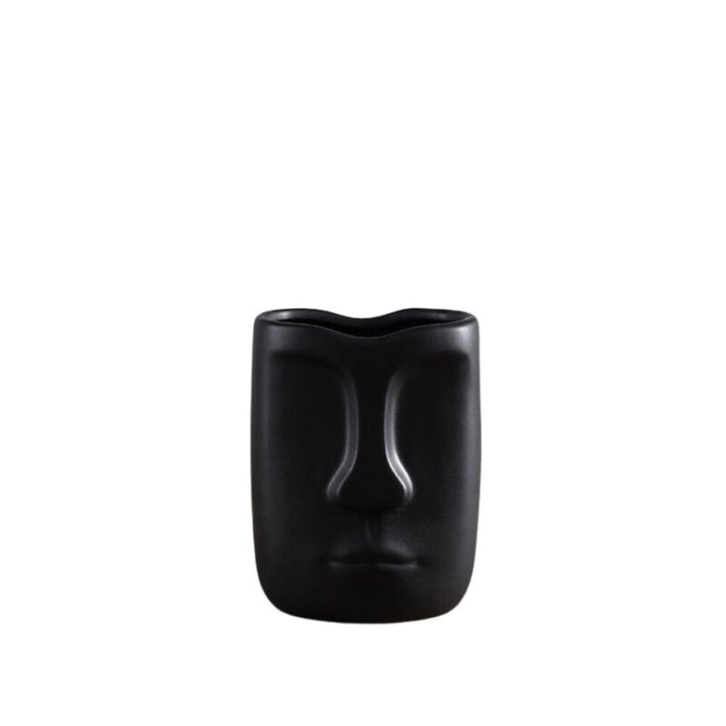 Vase noir en forme de tête