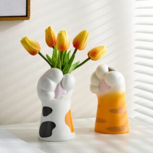 Vase original en forme de patte de chat colorée. Ce vase joli et mignon apporte une réelle originalité à votre décoration intérieure. Il offre une nouvelle possibilité d'exposer vos fleurs d'une manière audacieuse et unique.
