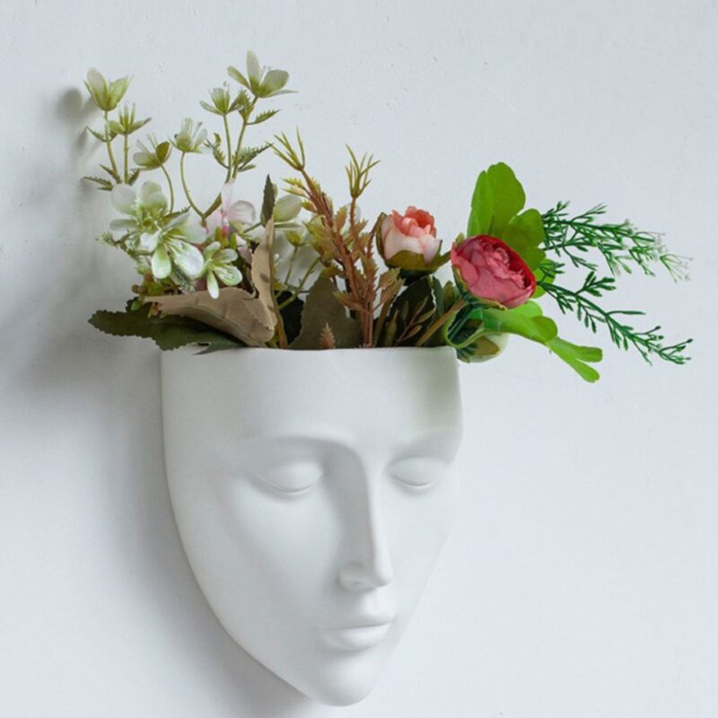 Vase blanc en forme de visage